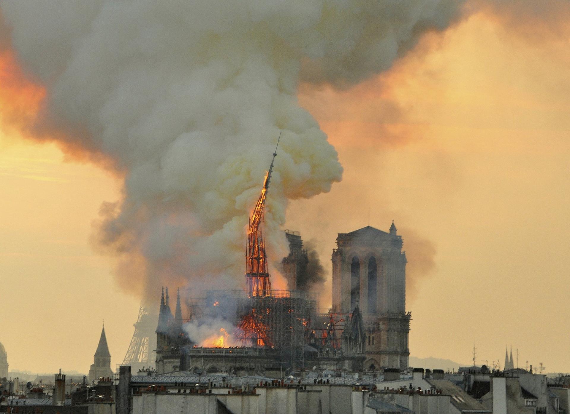 In Notre Dame fire, embers of unity for a fractured France