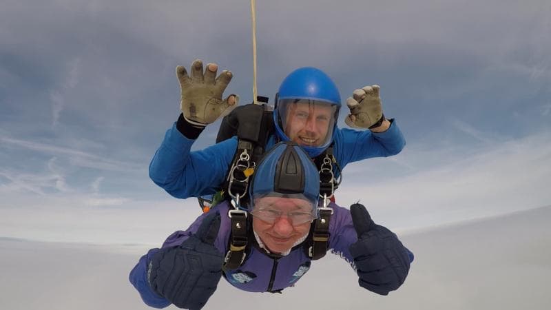 Bishop takes a (sky) dive to get pilgrims to Lourdes