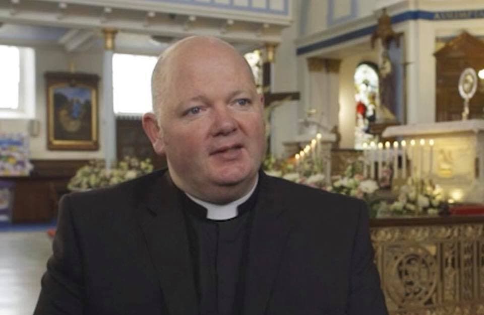 Catholic priest spat upon, parishioners heckled at Orange Order march in Scotland