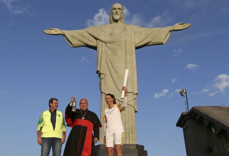 At Rio’s Christ the Redeemer statue, cardinal blesses Olympic torch