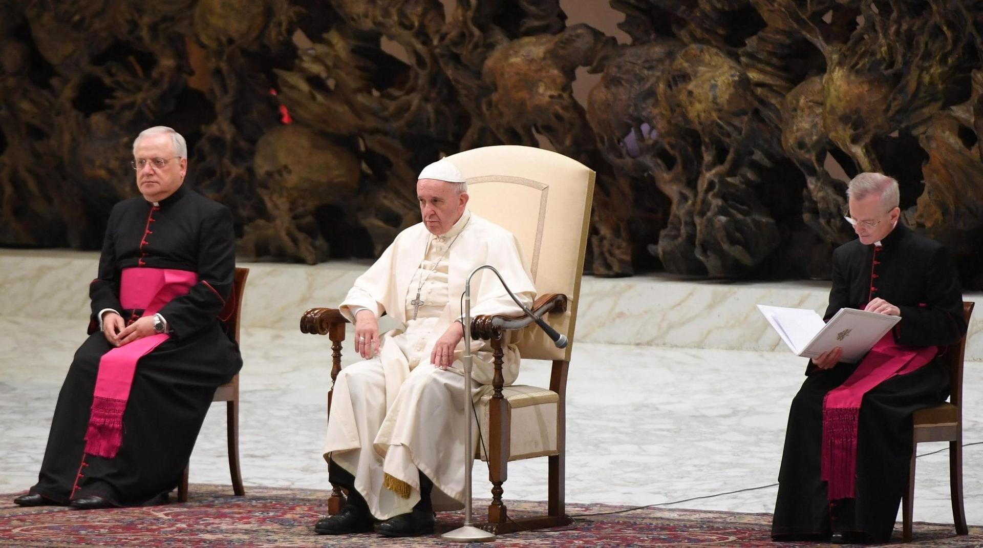 Pope has lunch with Syrian refugees he brought to Rome