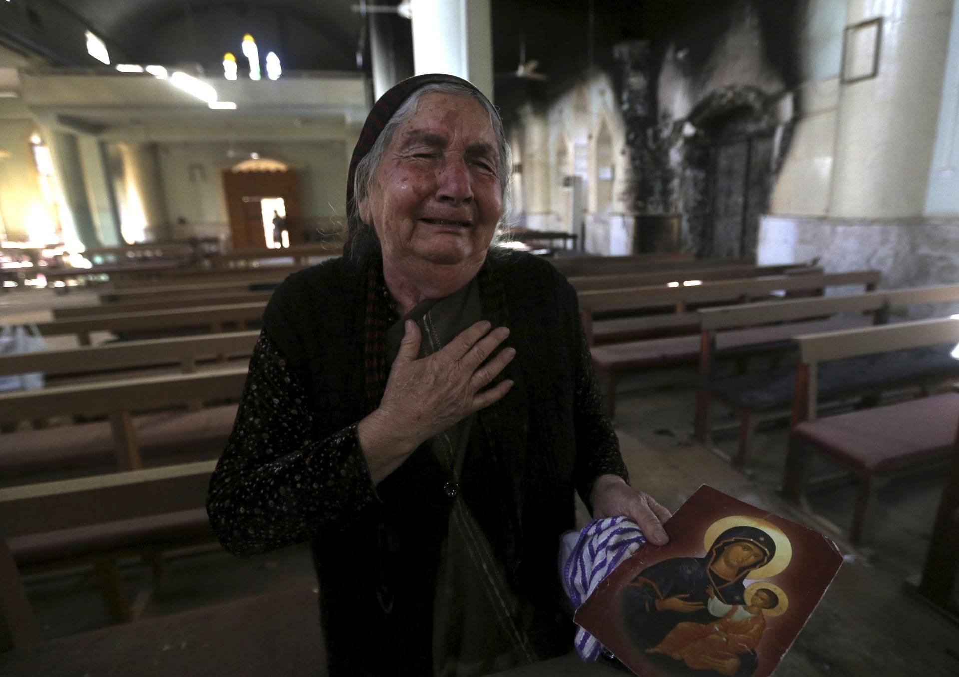 Gasps, tears as Iraqis return to ISIS-destroyed parish