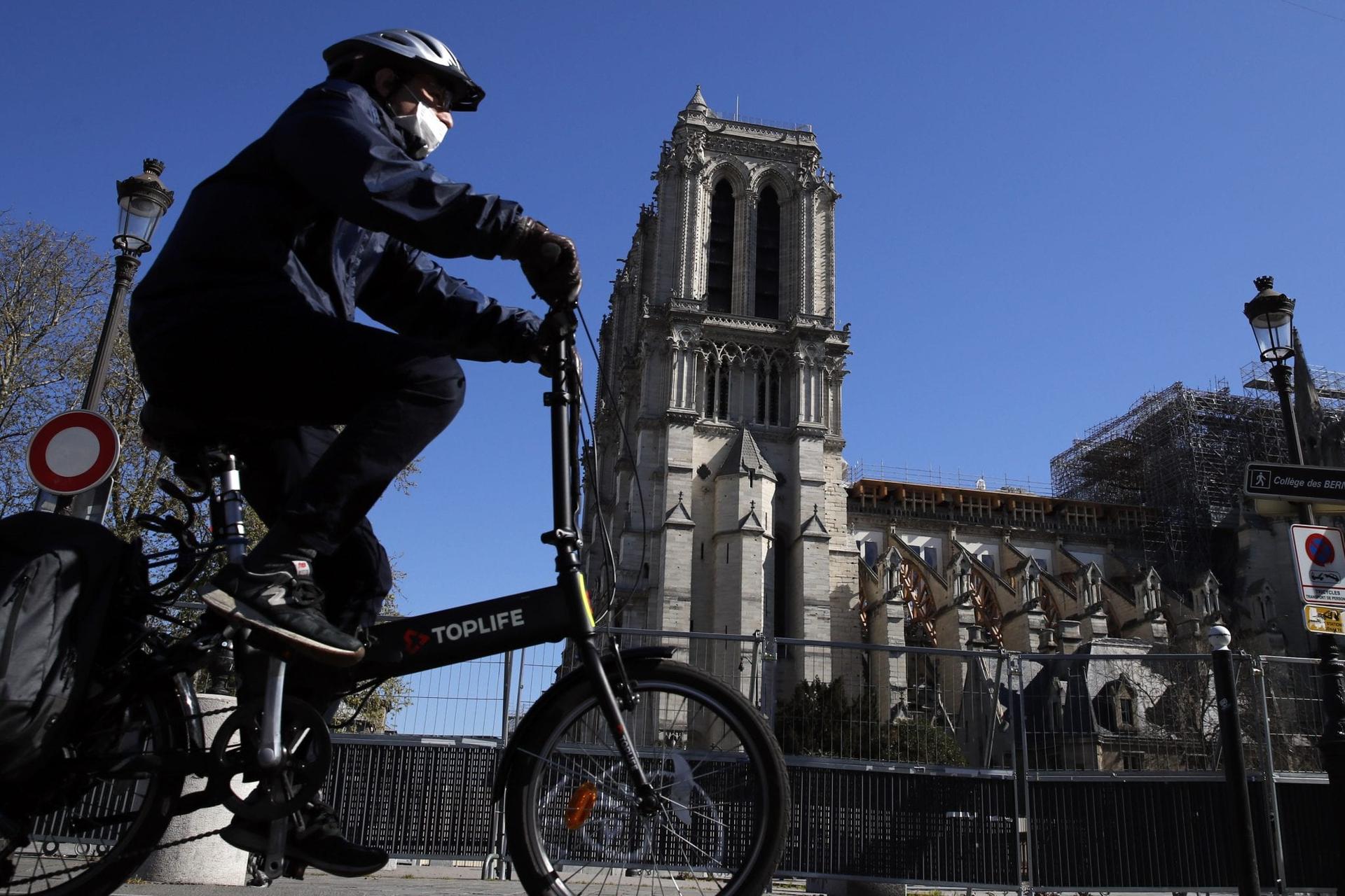 Still scarred, Notre Dame lives anew in coronavirus crisis