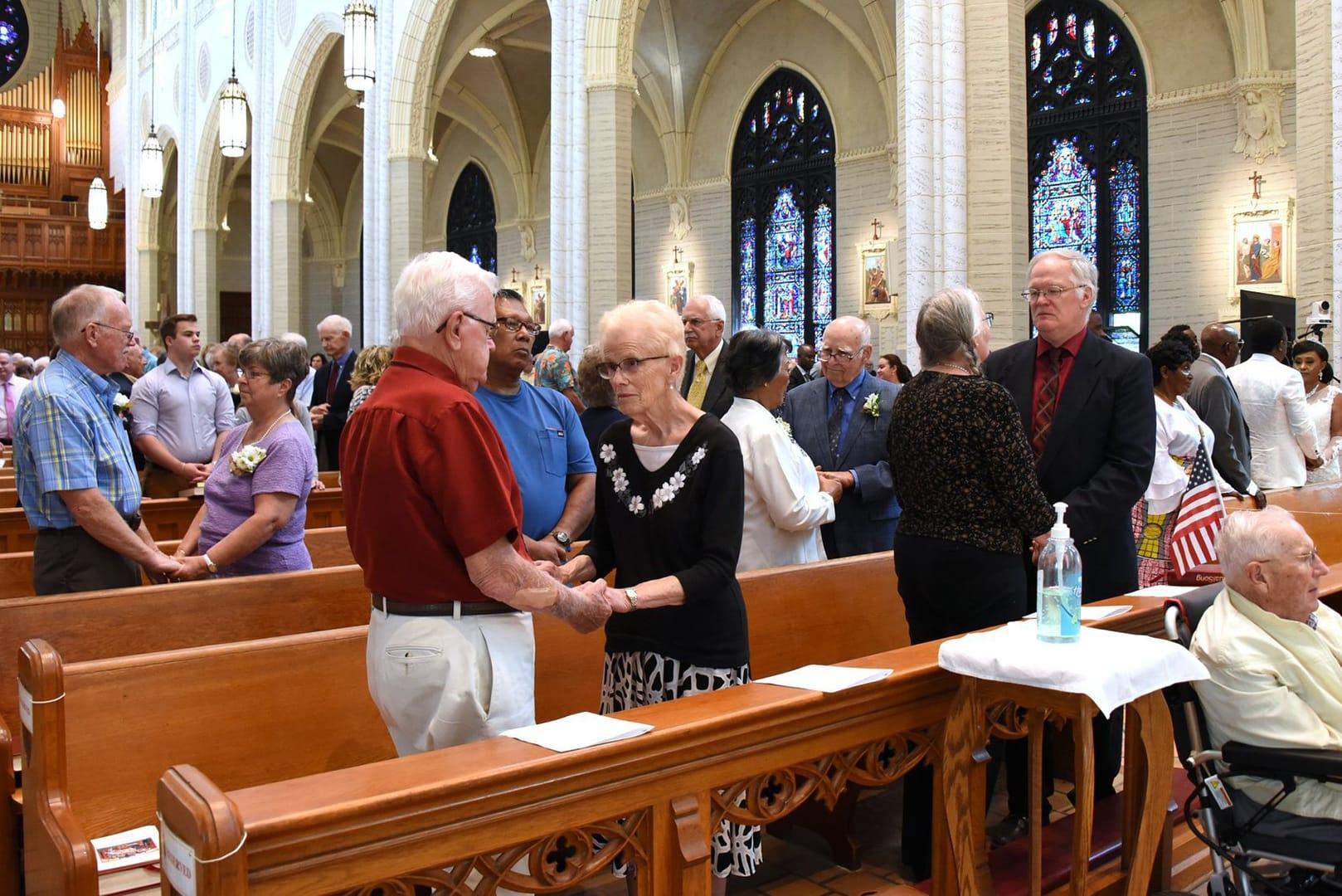 Long-married couples at annual Mass celebrate years together, strong faith