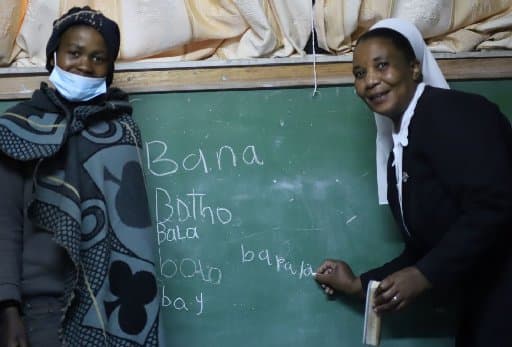 While animals rest, herders in Lesotho attend schools run by sisters