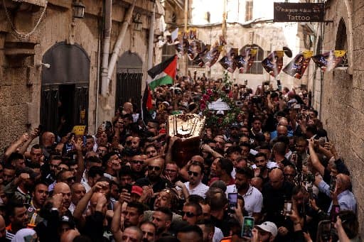 Israeli police attack pallbearers at Palestinian journalist’s funeral
