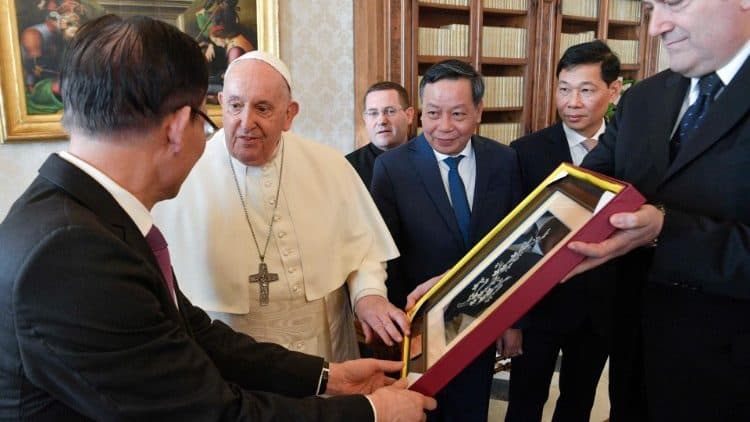 Vatican official says ties with Vietnam strengthening, predicts papal trip