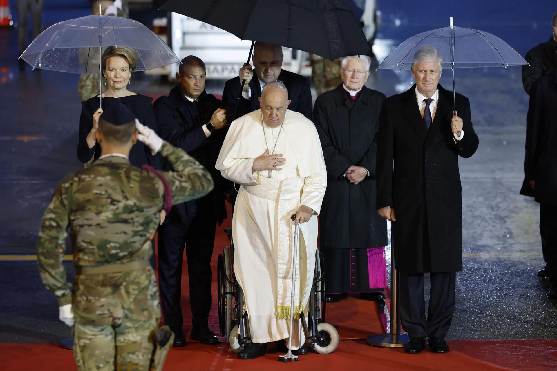 Pope in Belgium calls for peace, condemns abuse, forced adoptions