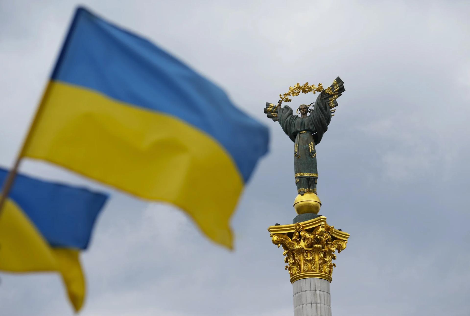 The Independence Monument is pictured as Ukrainian flags blow in the wind in Kyiv, Ukraine, on Aug. 23, 2025. (Credit: Sean Kilpatrick/The Canadian Press via AP.)