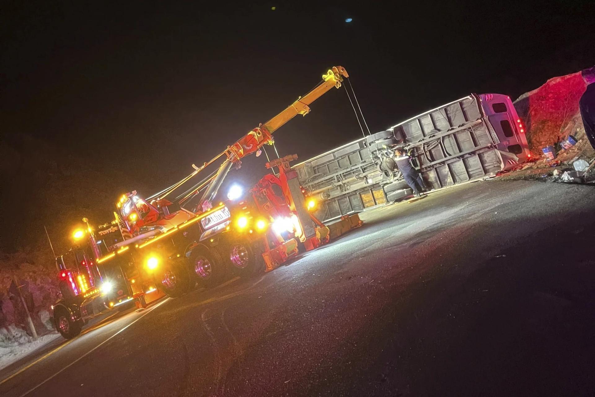 20 taken to hospitals after bus returning from church camp overturns on winding California road