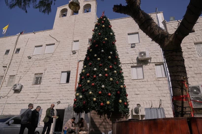 3 Palestinians arrested on suspicion of torching a Christmas tree at a Catholic church in West Bank