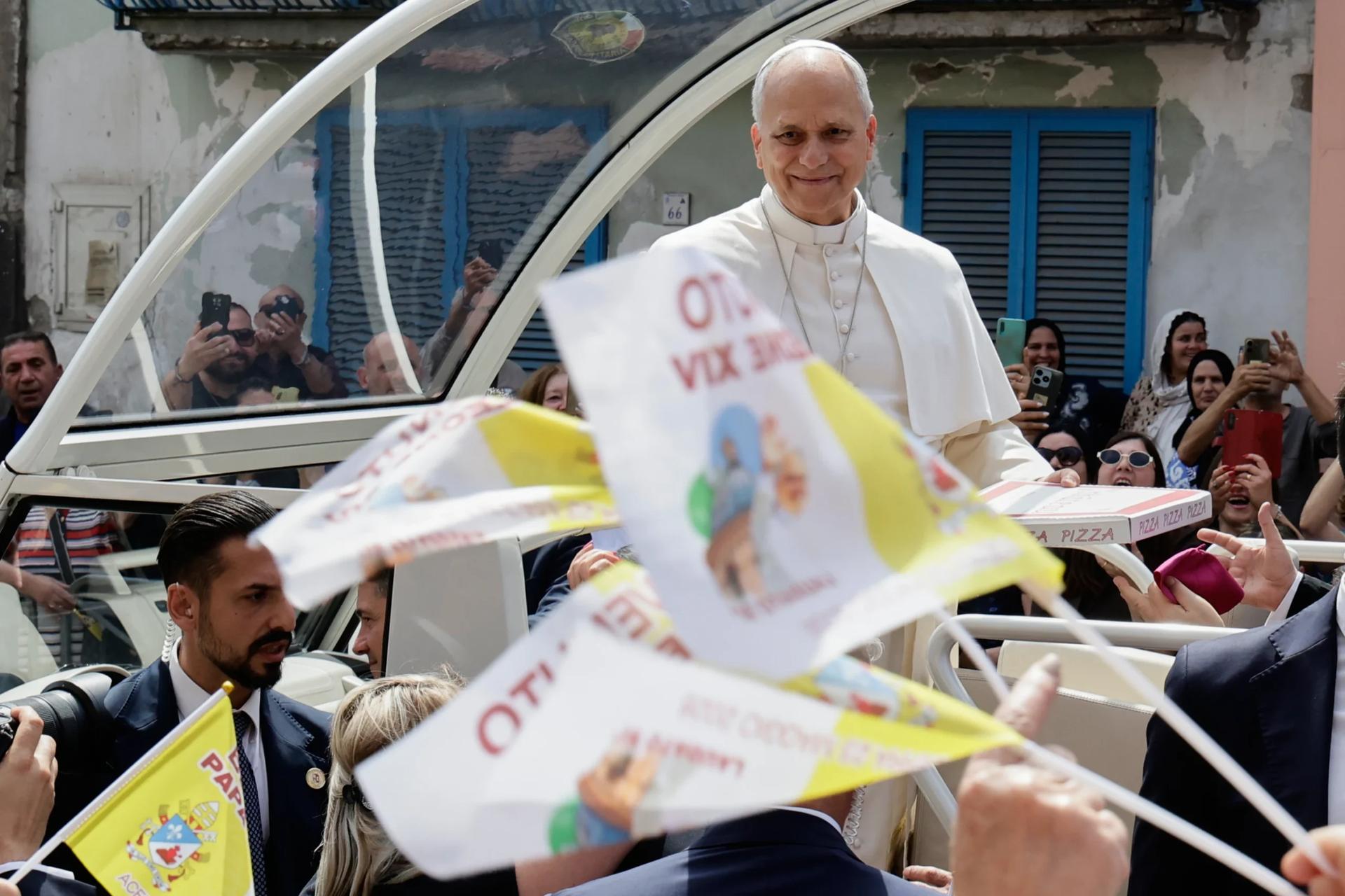 Pope Leo XIV rides on his popemobile during his one-day pastoral visit in Acerra, Italy, Saturday, May 23, 2026. (Credit: Salvatore Laporta/AP.)