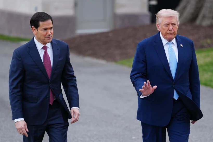 President Donald Trump walks with Secretary of State Marco Rubio to speak with reporters before departing on Marine One from the South Lawn of the White House, Friday, March 20, 2026, in Washington. (Credit: Julia Demaree Nikhinson/AP.)