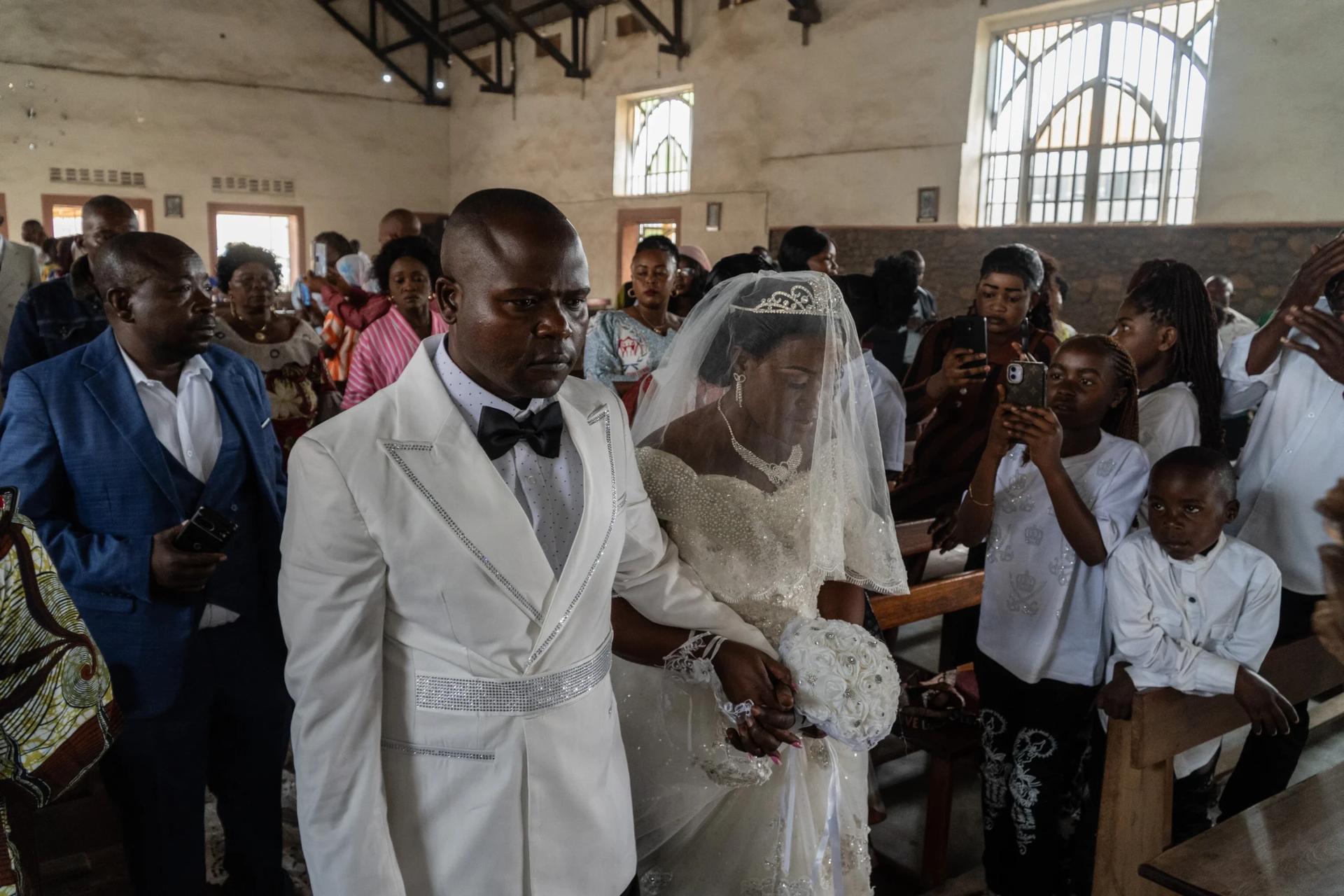Celebrating a Catholic wedding amid the Ebola outbreak: No kisses, but love lives here