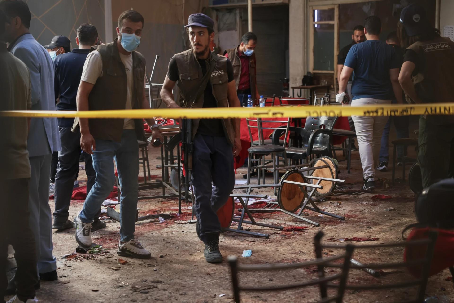 Explosive device goes off in cafe in Syria’s capital, killing at least 9 people