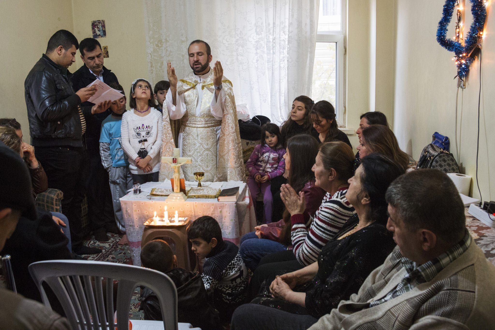 Chaldean Father Remzi Diril, also known as Father Adday, celebrates Mass at an apartment in Kirsehir, Turkey, November 10. (Credit: CNS photo/Oscar Durand.)