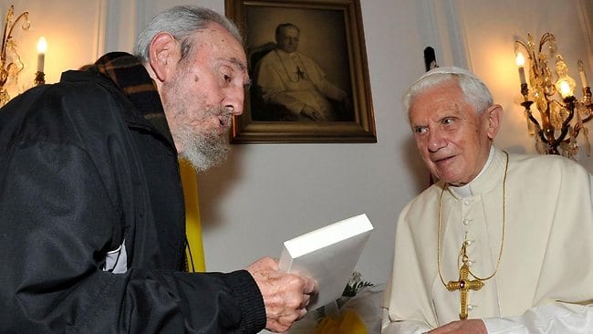 Emeritus Pope Benedict XVI welcomes Fidel Castro at the house of the papal representative in Cuba in 2012, during the pontiff's lone visit to the island nation. (Credit: IlSismografo.)