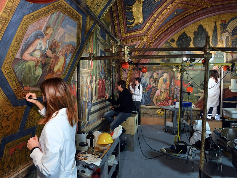 Art restorers at work in the Liberal Arts room of the Borgia Appartments in the Vatican Museum on December 12, 2016. (Credit: of Chris Warde-Jones.)